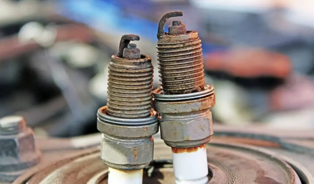 drivetrain malfunction bmw - overused spark plugs